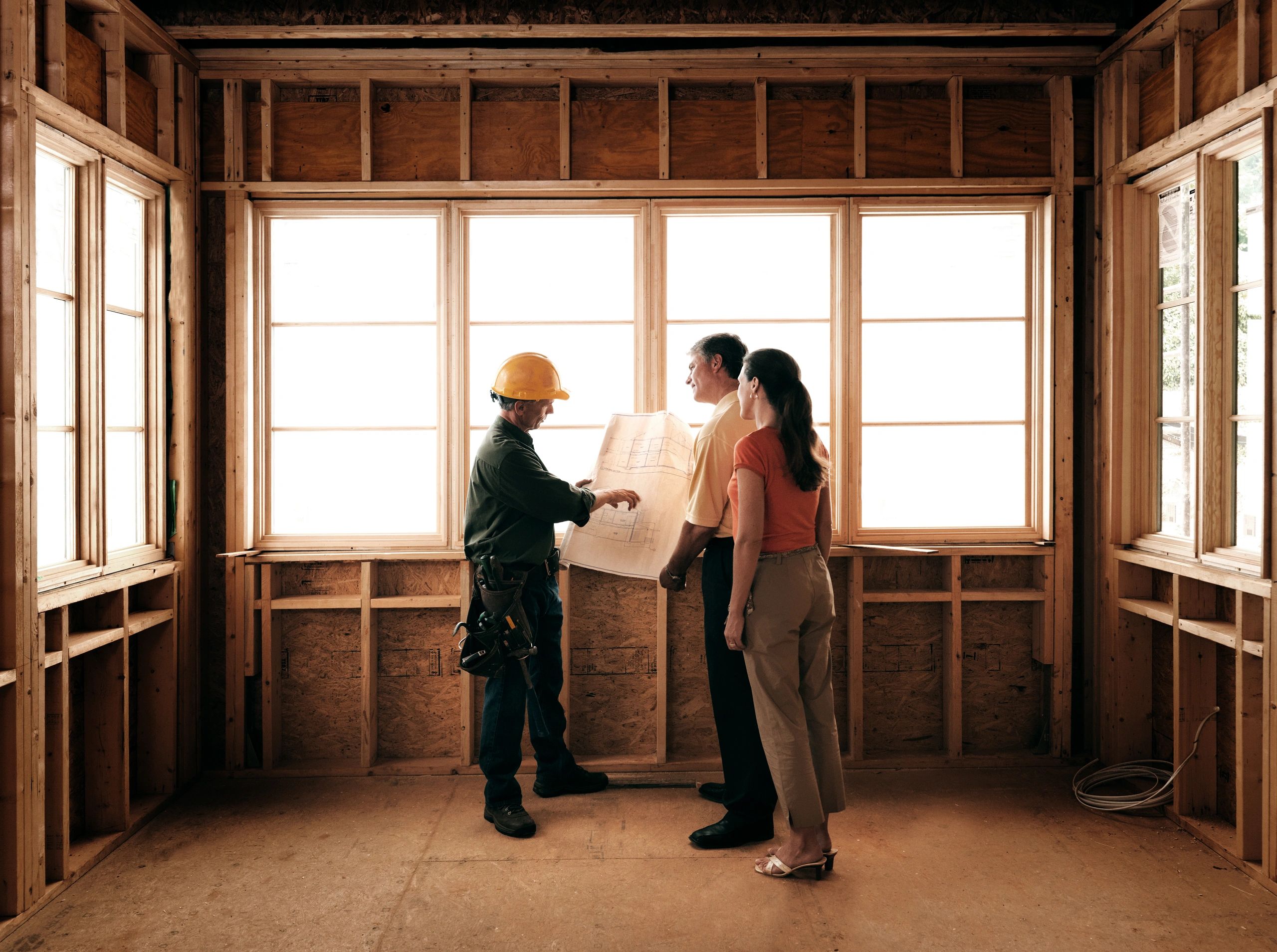 Client consulting with builder